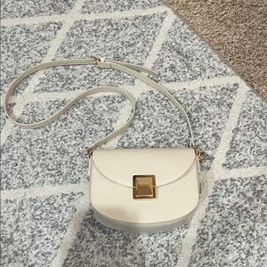Elegant Cream Crossbody Bag with Gold Hardware